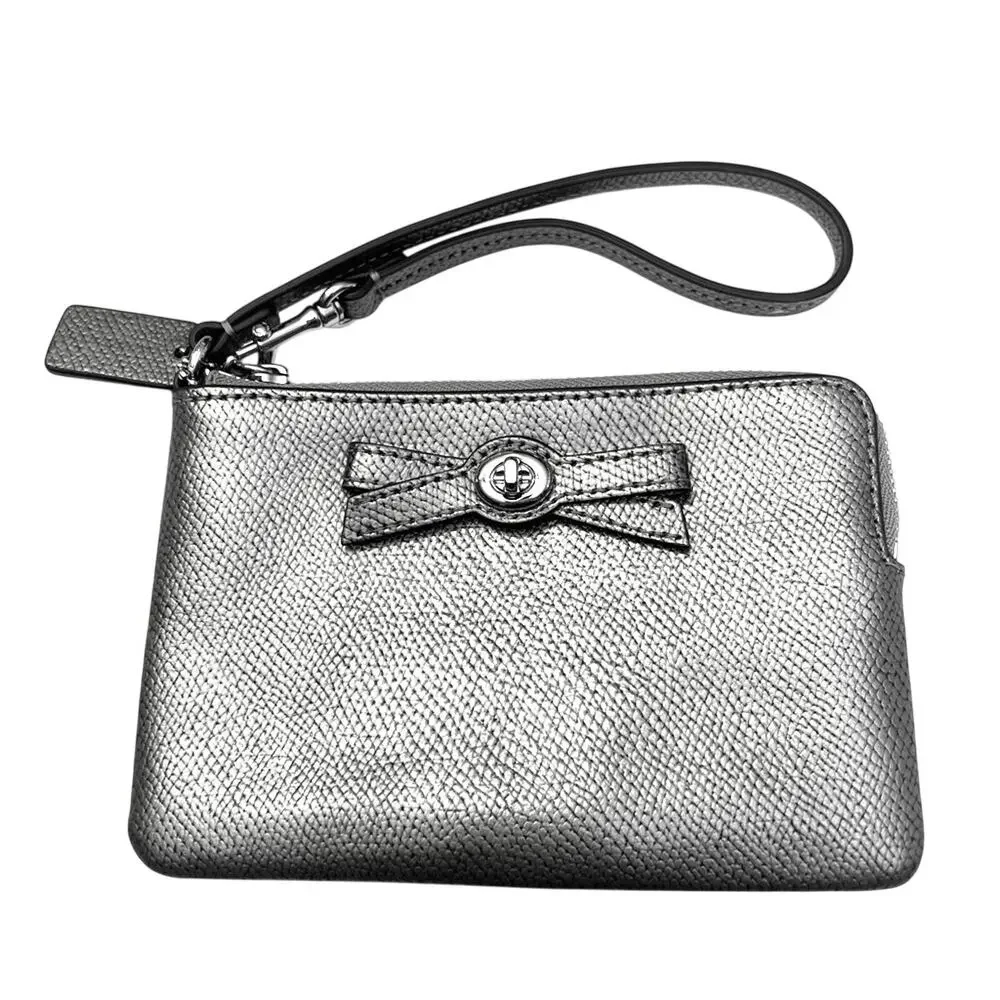 EUC Coach Metallic Silver Wristlet with Bow Detail
